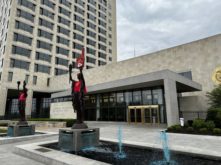 The statues outside the Bank were dressed for the NFL draft.