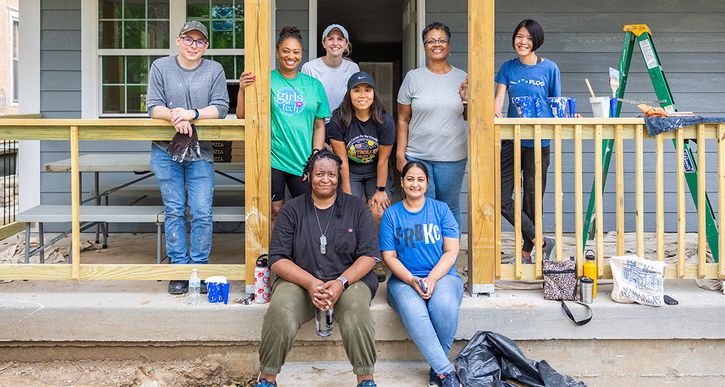 Employees from the Bank helped Habitat KC build two homes in the metropolitan area. Photos by Brett Smith