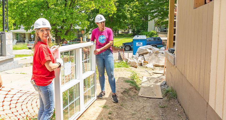 Employees from the Bank helped Habitat KC build two homes in the metropolitan area. Photos by Brett Smith